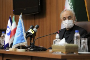 Head of the Atomic Energy Organization of Iran Ali Akbar Salehi sits in a press briefing with Director General of International Atomic Energy Agency, IAEA, Rafael Mariano Grossi in Tehran, Iran, Tuesday, Aug. 25, 2020. Salehi said his country won’t accept any additional demands beyond its commitments under the 2015 nuclear deal. The statement on Tuesday came as the chief of the U.N. nuclear watchdog was visiting Iran. (Atomic Energy Organization of Iran via AP)