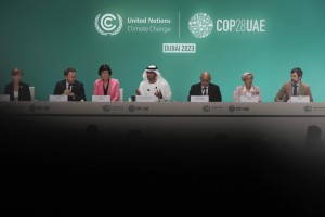 COP28 President Sultan al-Jaber, center, speaking during a news conference at the COP28 U.N. Climate Summit, Friday, Dec. 8, 2023, in Dubai, United Arab Emirates. (AP Photo/Peter Dejong) 