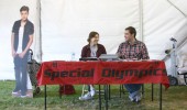 Hanging with Bieber: Senior Andi Ferraud-Shepher and junior Jonathon Christopher work the advanced public relations class booth during Conejo Valley Days to sell raffle tickets to benefit Ventura County Special Olympics.
Photo by Will Mauton - Staff Photographer