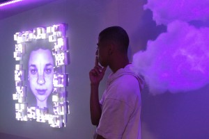 Kiyoshi Taylor (pictured), Annabelle Worrall, and Andrew Tufenkian created “The Purple Room,” part of the multimedia capstone exhibit CLUFest “Colors.” Photo by Katie May- Photojournalist.