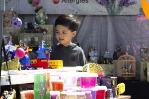 A fairly good time: In addition to crafts and games, children had the opportunity to play with toys of all sorts at entertainment booths throughout the quarter-mile stretch of fair grounds. Photo by Gabby Flores - Photojournalist