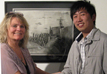aa-printmaking-instructor-kristi-colell-and-jason-nuygen-view-jason-s-print-at-the-ink-and-clay-invitational-art-show2