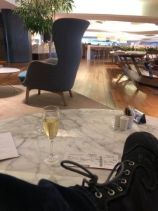 Emergency same-day flight in the midst of a raging global pandemic? Seems like a good time to upgrade and enjoy some free drinks.